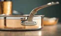 Hestan CopperBond Induction Cookware 3.5 Qt Covered Saute With Helper Handle -Cookware & Knives Shop 31598 hcb hestan copperbond 3.5qt saute pan closeup on handle
