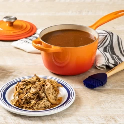 Le Creuset 1.75 Qt. Signature Enameled Cast Iron Saucepan With Stainless Steel Knob | Flame Orange -Cookware & Knives Shop flame