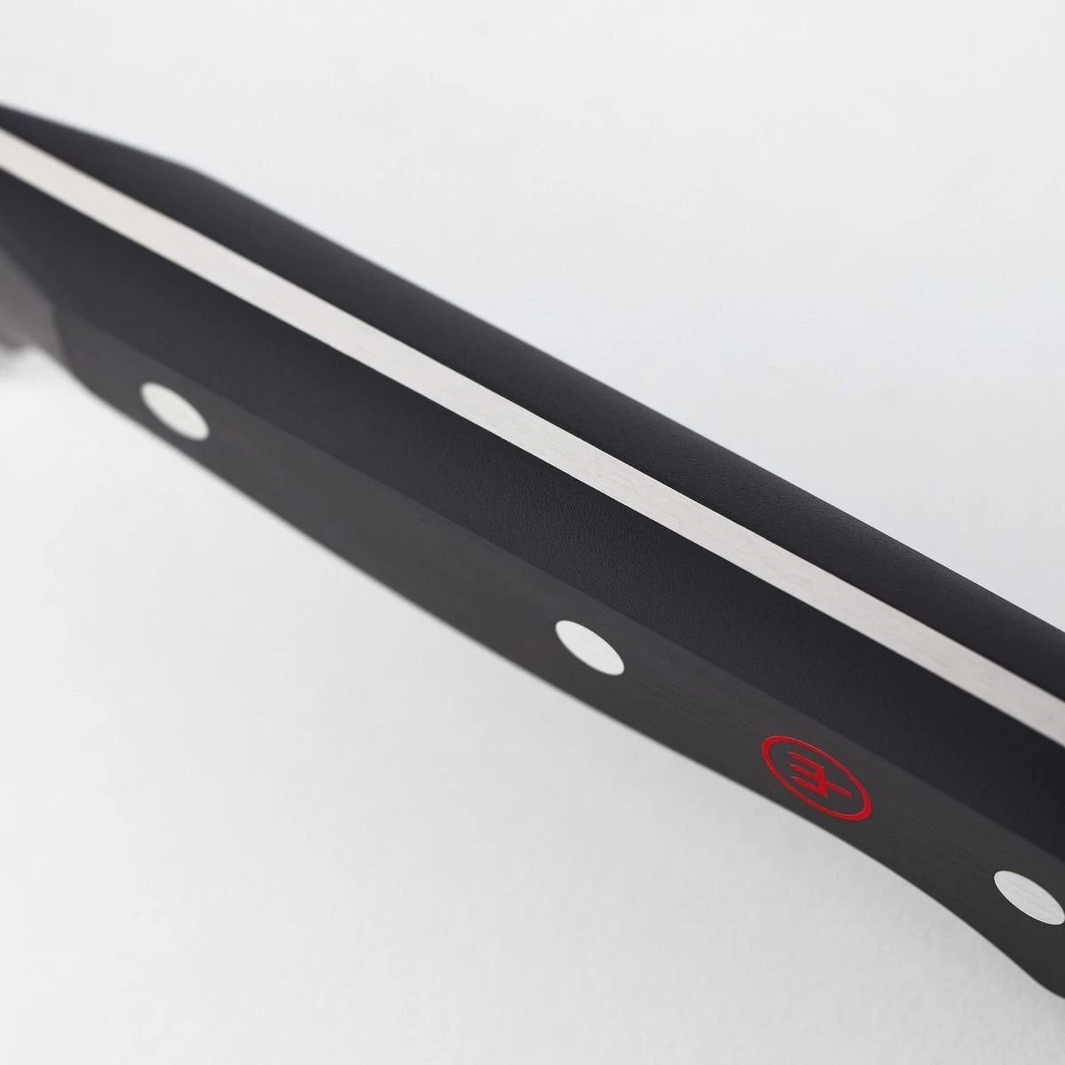 Wusthof Gourmet 4.5" Utility Knife | Serrated Rounded Tip 5 Wusthof Gourmet 4.5" Utility Knife | Serrated Rounded Tip - Image 3