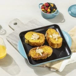 Le Creuset 9.5" Square Signature Enameled Cast Iron Grill Pan | Caribbean Blue 11 Le Creuset 9.5" Square Signature Enameled Cast Iron Grill Pan | Caribbean Blue -Cookware & Knives Shop l2127 2417 d 1